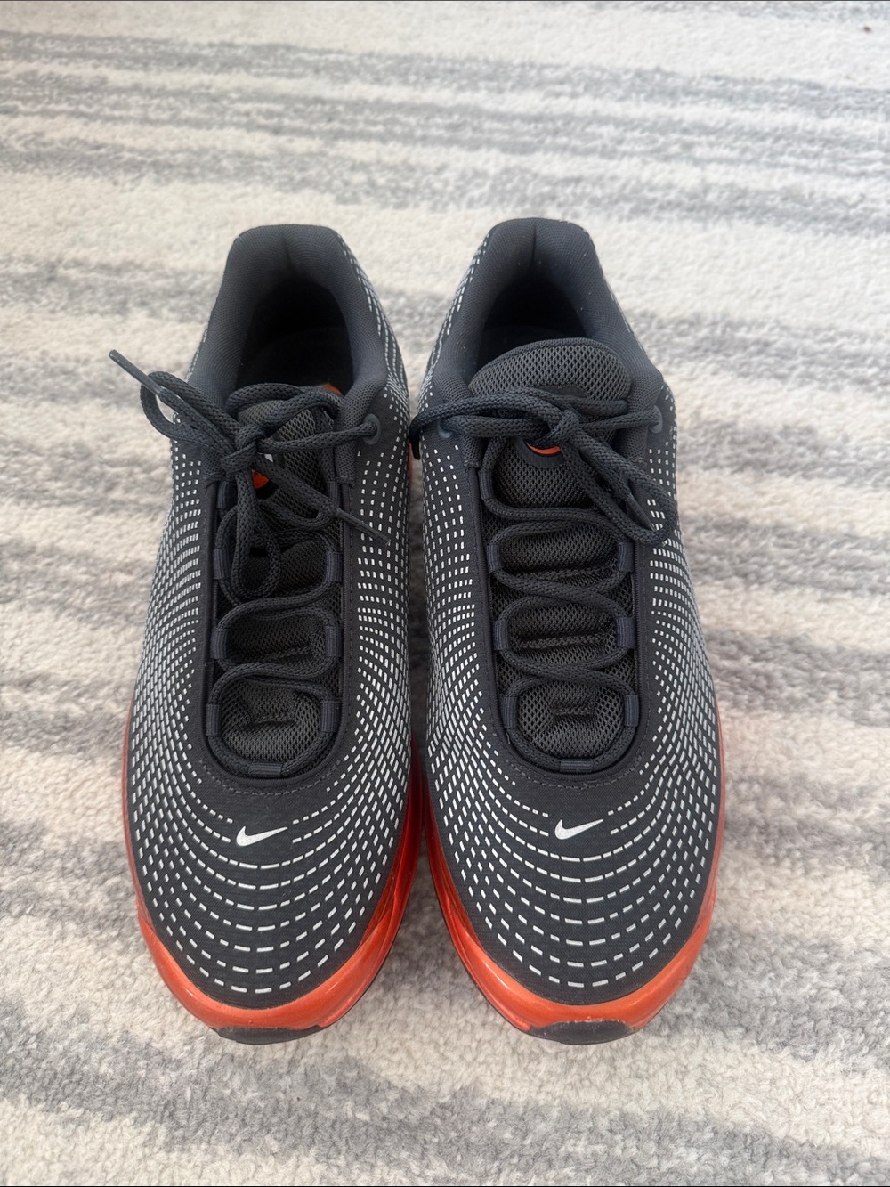 Nike Men’s Black Sneakers with Orange Accents